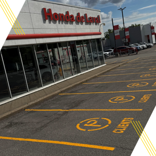 Marquage de stationnement client devant le concessionnaire Honda de Laval